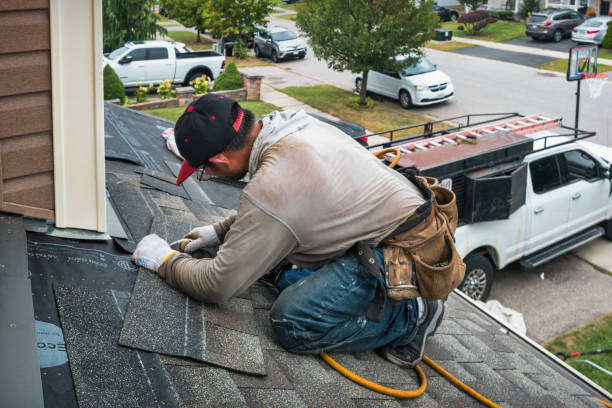 Professional Roofing technician working in Mc Donough, NY